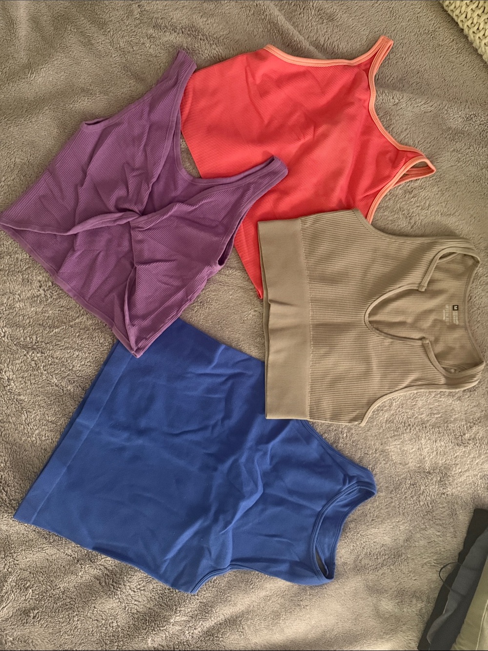 •Lot of 4 colorful workout tops•